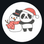 Panda With Snowman In Winter For Christmas Runder Aufkleber<br><div class="desc">Panda with snowman in winter for Christmas - a snowman for winter and Christmas. A winter greeting in the cold season for the holidays. Christmas panda with snowman.</div>