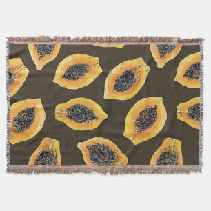 Papaya-Scheiben auf dunkelbraun Decke