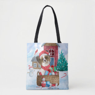 Papillon Dog im Schnee Weihnachtshundehaus