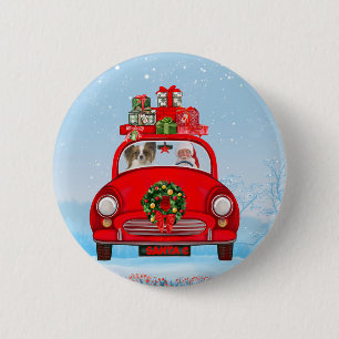 Papillon Dog in Auto mit dem Weihnachtsmann Button