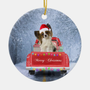 Papillon Hund im Schnee sitzen im Weihnachtswagen Keramik Ornament