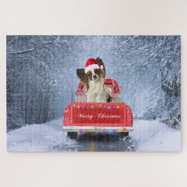 Papillon Hund im Schnee sitzen im Weihnachtswagen Puzzle (Horizontal)