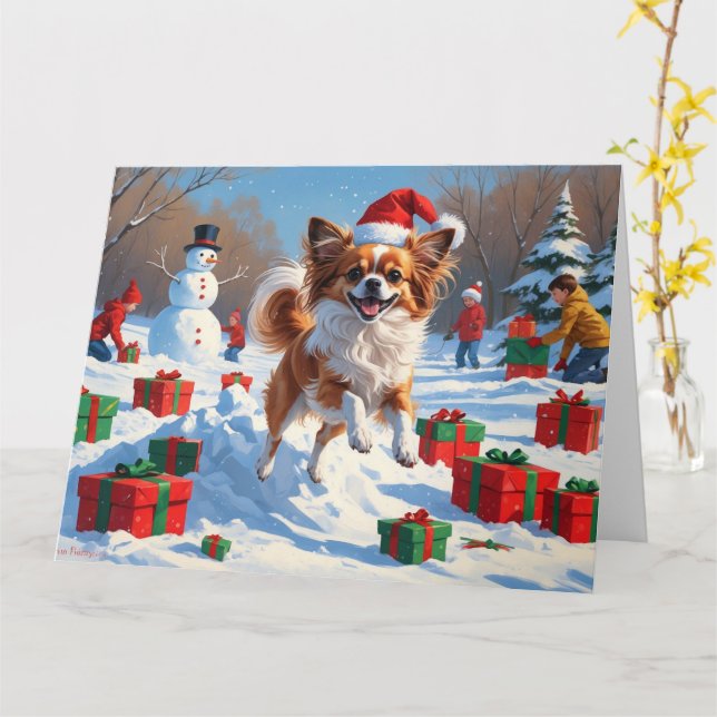 Papillon Hund läuft im Schnee mit Weihnachtshut Karte (Gelbe Blume)