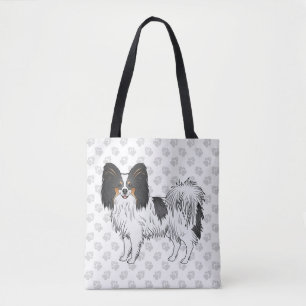 Papillon-Hund mit dreifarbigem Cartoon-Muster und