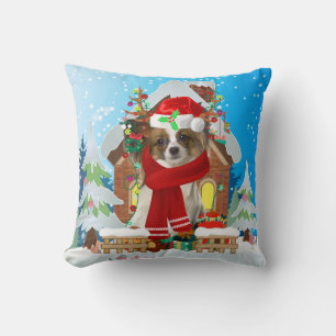 Papillon Hund mit Weihnachtsgeschenken Kissen