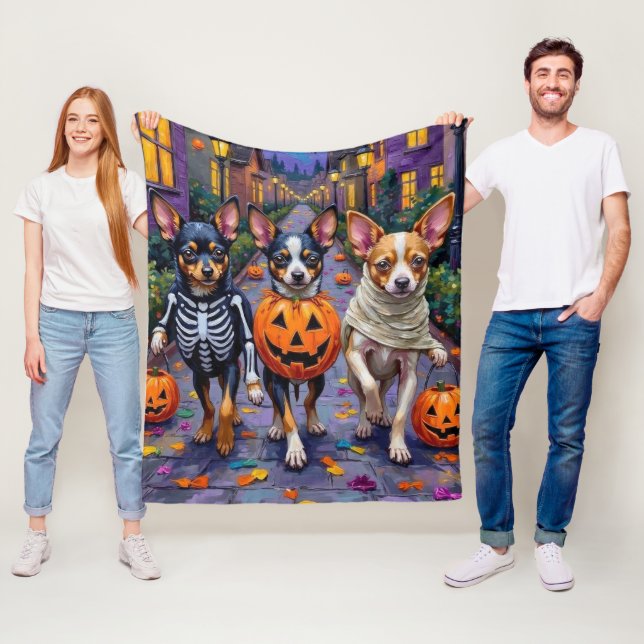 Papillon-Hunde beim Trick-or-Treaten an Halloween- Fleecedecke (Beispiel)