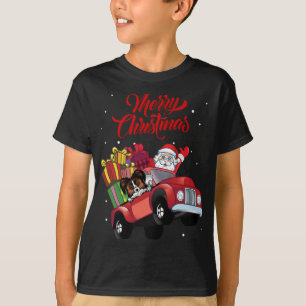 Papillon mit dem Weihnachtsmann im roten Lkw-Hund T-Shirt
