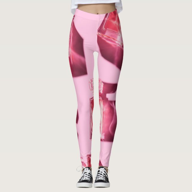 Parfümflaschen, rosa Hintergrund, flach Leggings (Vorderseite)