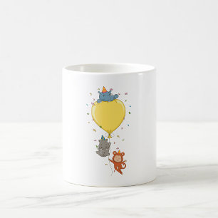 Partytierchen halten einen Luftballon Kaffeetasse