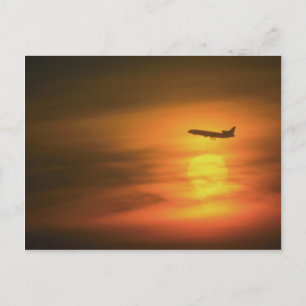 Passagierjet bei Sonnenuntergang, auf der Strecke  Postkarte