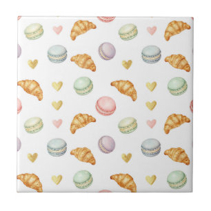 Pastell-Macarons und Croissants nahtloses Muster Fliese