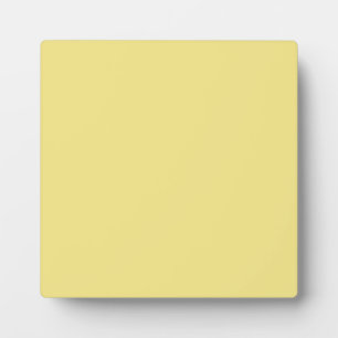 Pastellbutter, gelber Hintergrund bereit zur Anpas Fotoplatte