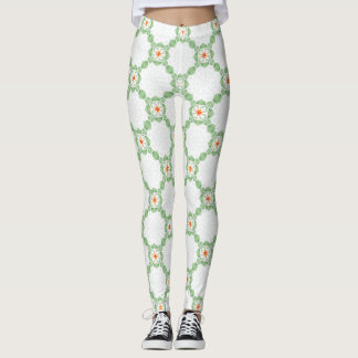 Pastellgrüne und orangefarbene Blumenblatt-Muster- Leggings