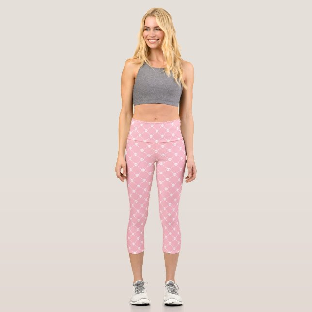 Pastellrosa Halbkugel zwischen Schädelkreuzen Capri Leggings (Vorderseite)