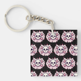 Pastellrosa Totenkopf und Kreuzknochen Schlüsselanhänger