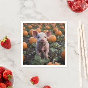 **"Patch of Joy: A Happy Baby Pig Under Pumpkins"* Serviette