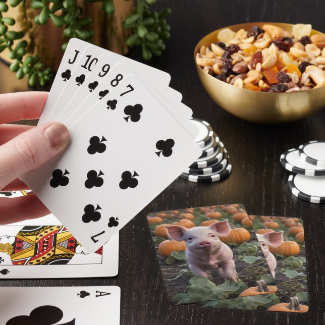 **"Patch of Joy: A Happy Baby Pig Under Pumpkins"* Spielkarten (In Situ)