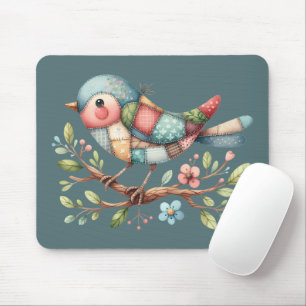 Patchwork-Singvogel auf blühendem Ast Mousepad