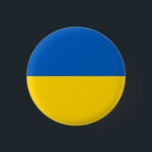 Patriotische Ukraine-Flagge Button<br><div class="desc">Patriotische Flagge der Ukraine.</div>