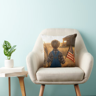 Patriotischer Junge mit amerikanischer Flagge und  Kissen