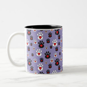 Paw Prints mit roten Herzen auf blau Zweifarbige Tasse