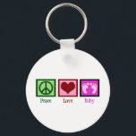 Peace Liebe Baby Girl Schlüsselanhänger<br><div class="desc">Dieses hübsche Baby-Geschenk der Liebe eignet sich perfekt für eine Babydusche für ein neues kleines Mädchen! Enthält niedliche rosa Fußabdrücke.</div>