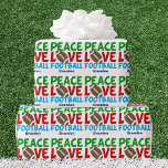 Peace Liebe Football Custom Christmas Geschenkpapier<br><div class="desc">Peace Liebe Football. Niedliche personalisierte blaue Weihnachtsverpackung für einen Fußballspieler oder Trainer. Dieses coole Sportmuster ist grün,  rot und blau mit dem Ball in der Mitte.</div>