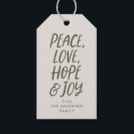 Peace Liebe hope joy green Christmas type Geschenkanhänger<br><div class="desc">Eine perfekte Botschaft für den Urlaub - Ruhe, Liebe, Hoffnung und Freude. Dieses trendige Grün- und Beige-Geschenkschild mit handgeschriebenem Aussehen und personalisierter Botschaft und Namen. Dieses originale Weihnachtsschild von Lea Delaveris Design passt perfekt zur Peace Liebe Hope Joy Kollektion und wurde auf das Verpackungspapier abgestimmt. Finden Sie mehr Farben und...</div>