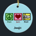Peace Liebe Music Custom Christmas Keramik Ornament<br><div class="desc">Hübscher personalisierter Musiker Weihnachtsschmuck mit einem friedlichen Zeichen,  Herz,  einem Treppenschmuck und musikalischem Personal. Cooles individuelles PEACE LIEBE MUSIC Geschenk für einen Komponisten,  Musiklehrer,  Band Regisseur oder Chordirigenten,  um ihren Musikstudenten zu geben.</div>