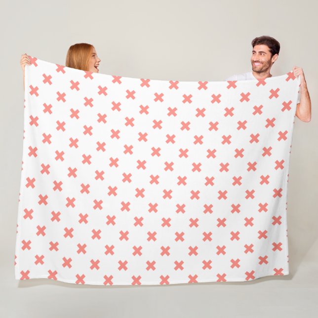 Peach cross stitches auf weiß fleecedecke (Beispiel)