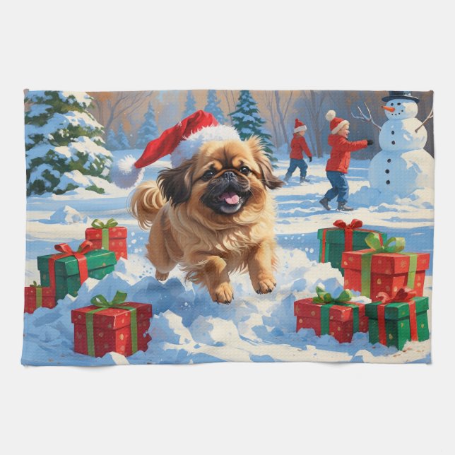 Pekingese Hund läuft im Schnee mit Weihnachtshut Geschirrtuch (Horizontal)