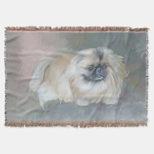 Pekingeser auf Taupe Decke