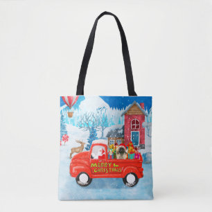 Pekingeser-Hund Weihnachtslieferwagen Schnee