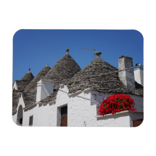Pelargonie-Blumen und trulli Häuser in Alberobell Magnet