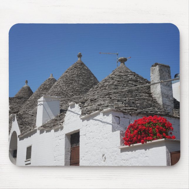 Pelargonie-Blumen und trulli Häuser in Alberobello Mousepad (Vorne)