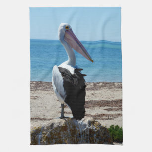 Pelican auf einem Felsen, Handtuch