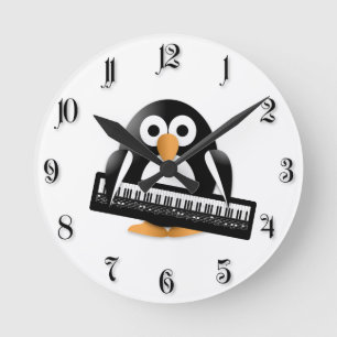 Penguin with piano runde wanduhr