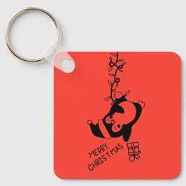 Penguine distributing christmas gifts schlüsselanhänger