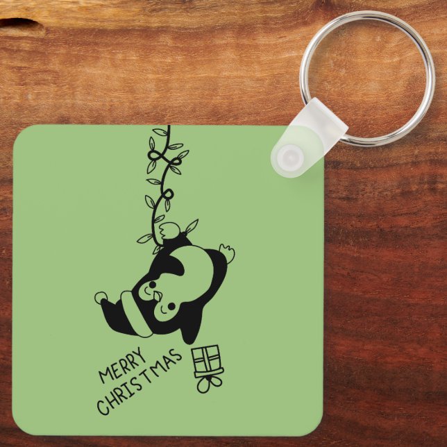 Penguine distributing christmas gifts schlüsselanhänger