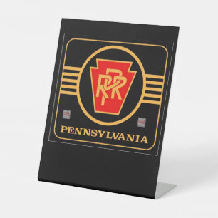 Pennsylvania Eisenbahn-Logo schwarz und gold       Sockelschild