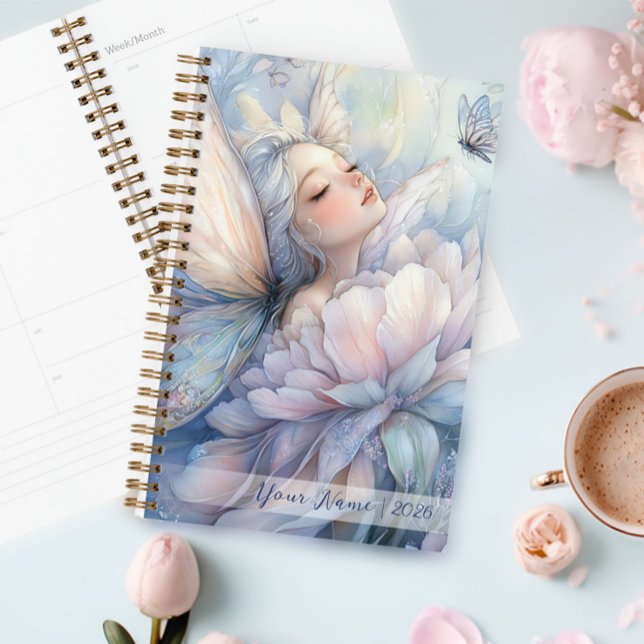 Peony Of The Dawn Planer (Peony Of The Dawn Planner in a table next to a cup of cappuccino)