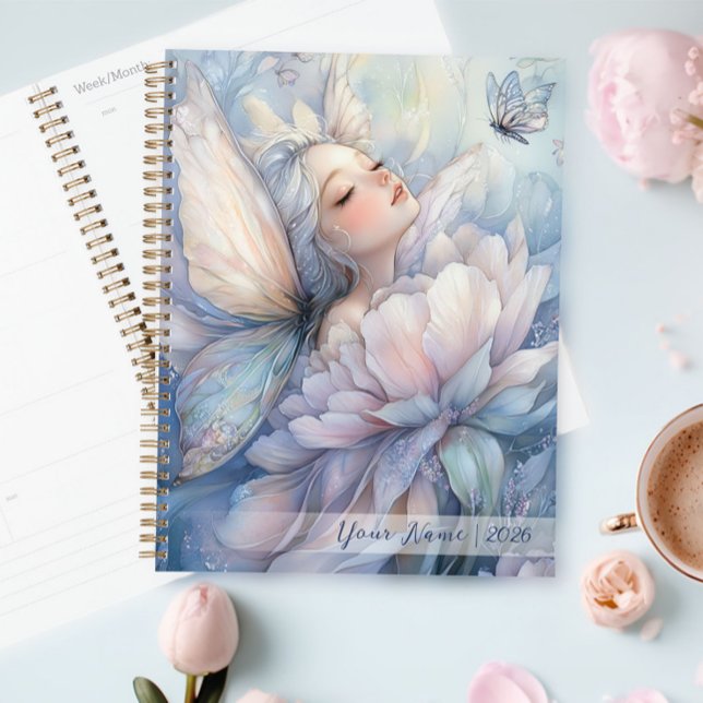 Peony Of The Dawn Planer (Peony Of The Dawn planner on the table, next to a cup of coffee)