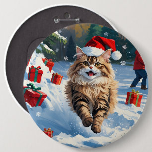 Perserkatze sitzt im Schnee mit Weihnachtsmütze Button
