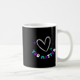 Person hinter Suizidprävention Depression Awaren Kaffeetasse