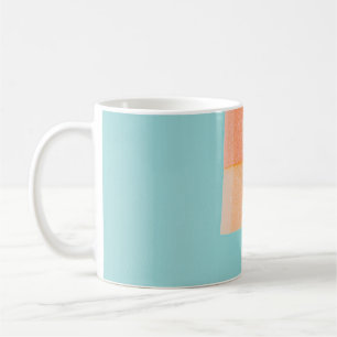 Person mit gelbem und braunem Eis Kaffeetasse