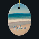 Personalisiert Beach Foto Blue Landschaftlich Keramik Ornament<br><div class="desc">Ein schönes Vintages Foto eines Strandes in Kalifornien ovale Keramik Weihnachtsschmuck. Passen Sie Ihren Namen an,  um Ihr eigenes personalisiertes Geschenk zu kreieren. Für kürzere Namen gibt es viel Platz,  um den Schriftart zu vergrößern. Es gibt viele schöne,  moderne Kalligraphie-Schriftzeichen zur Auswahl.</div>