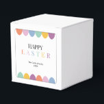 Personalisiert Happy Osterfarben Einfache Moderne Geschenkschachtel<br><div class="desc">Personalisiert Happy Oaster Colorful Simple Modern Favor Boxes bietet einen weißen Hintergrund mit einem spielerischen und farbenfrohen Design. Die Vorderseite zeigt einen modernen "EASTER"-Text in eleganten, lebhaften Farben, zusammen mit illustrierten Ostereiern. Eine dünne, abgerundete Ecke umrahmt das Design und fügt eine weiche und stilvolle Touch hinzu. Ideal für ein Ostereierjagd...</div>