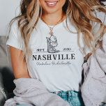 Personalisiert Nashville Junggeselinnen-Abschied C T-Shirt<br><div class="desc">Lassen Sie sich mit unseren Personalisierten Nashville Junggeselinnen-Abschied Custom T - Shirt zu einem unvergesslichen Nashville Junggeselinnen-Abschied verführen! Diese maßgeschneiderten "Nash Bash" T-Shirts sind die perfekte Mischung aus Stil und Spaß, zugeschnitten auf die ultimative Cowgirl-Feier. Diese Shirts mit ihren ikonischen Cowboystiefeln und spielerischen Designs erfassen das Wesen eines Nashville-Party und...</div>