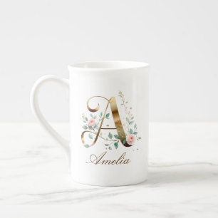 Personalisierte goldene Blumenmonogramm-Initiale A Prozellantasse