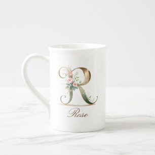 Personalisierte goldene Blumenmonogramm-Initiale R Prozellantasse